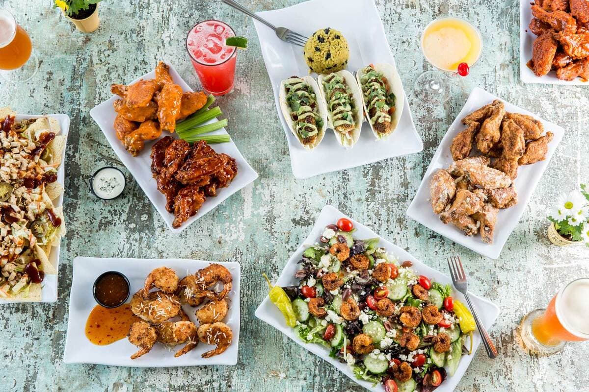 Island Wing Co. Grill and Bar Landing at Tamaya Market