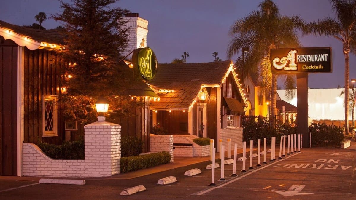 A Restaurant completes a century in Newport Beach, celebrating its evolution from The Arches in 1926 to a modern coastal steakhouse.