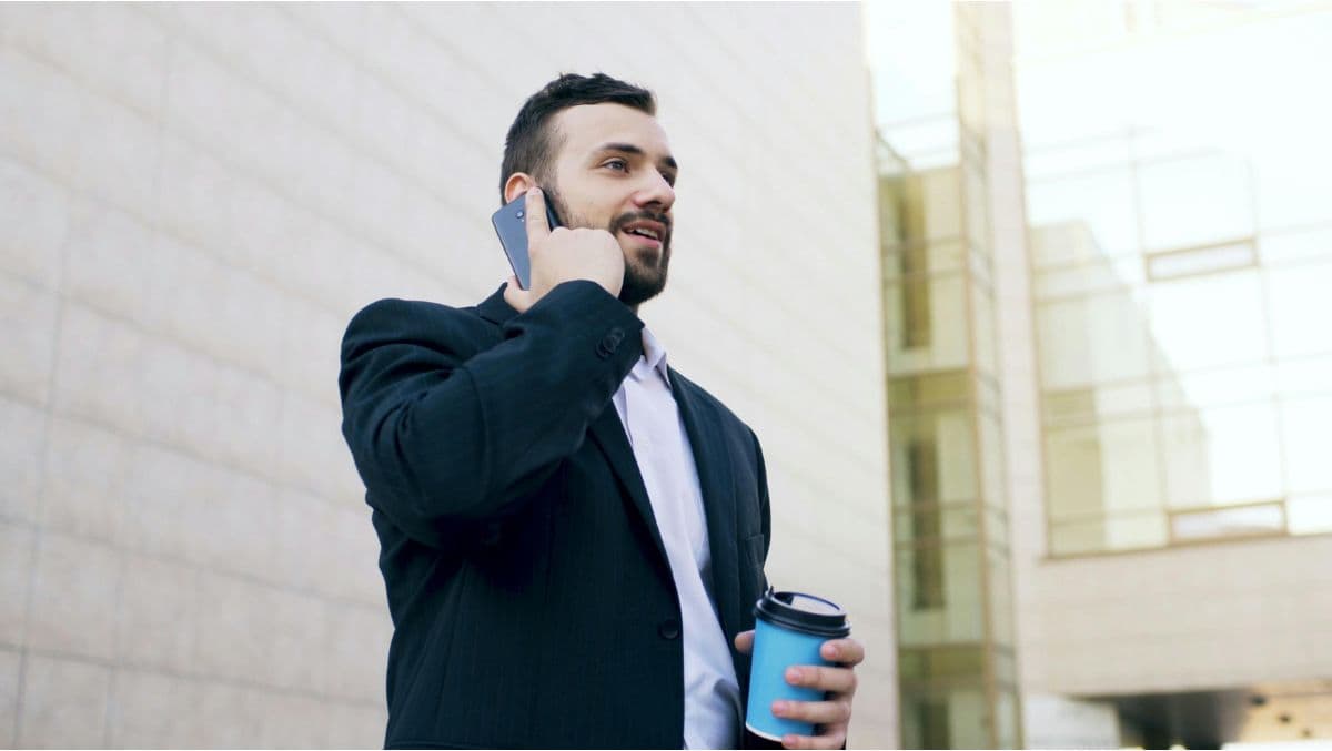 Person talking over the phone image