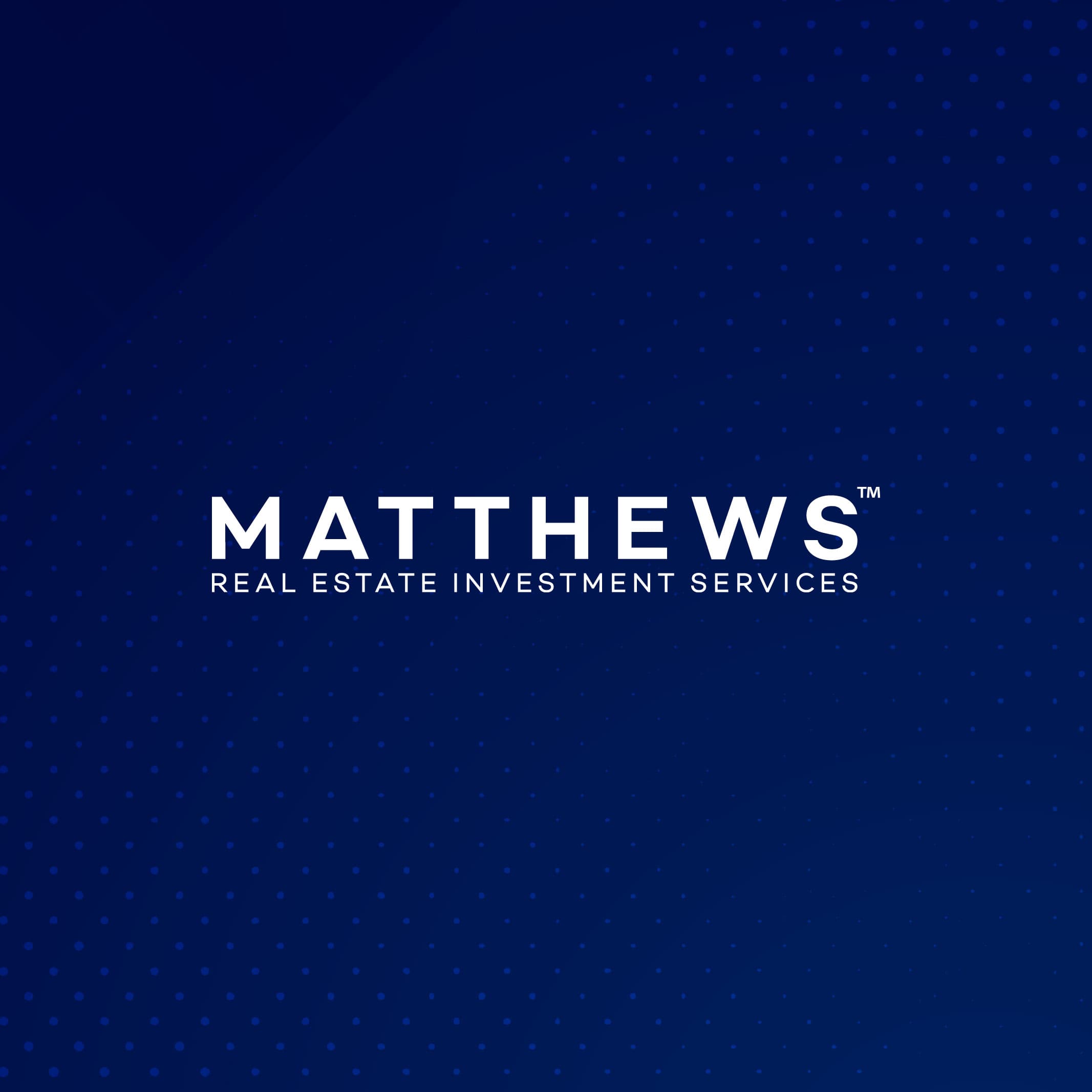 Matthews Real Estate Investment Services™ logo