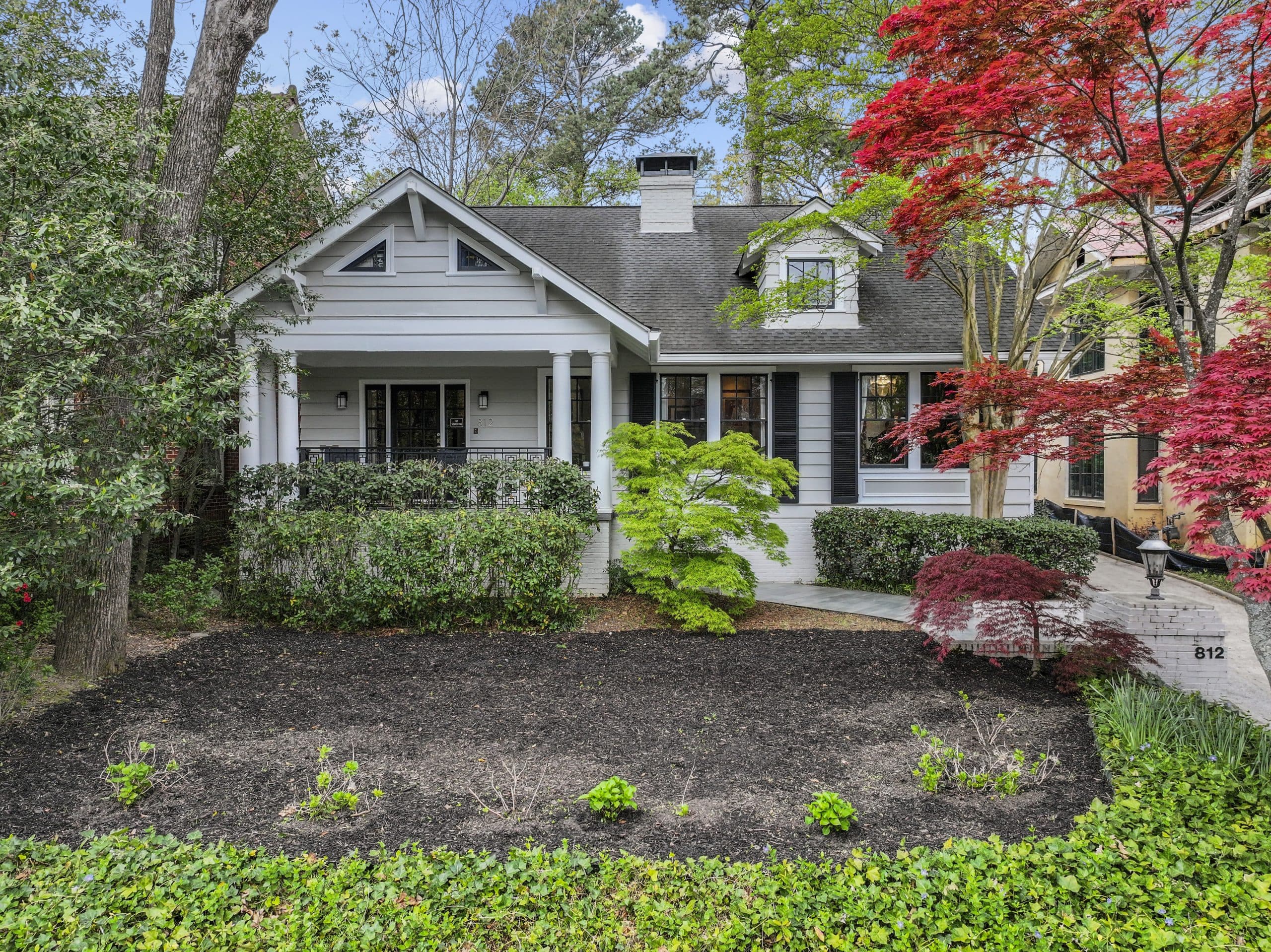 Garden District Living with Midtown Skyline Views and Outdoor Connection
